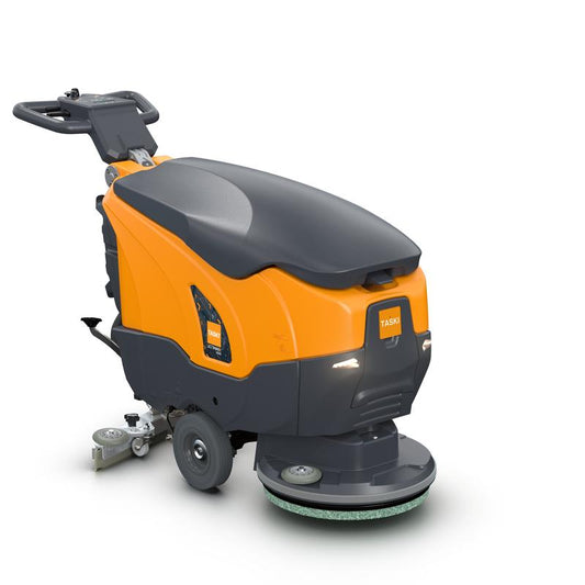 Die TASKI ULTIMAXX 900 SD43 von Diversey Deutschland GmbH & Co. OHG ist eine antriebslose Scheuersaugmaschine der nächsten Generation mit einem 20-Liter-Tank und einer 43-cm-Einzelscheibe, die sich durch ein orange-graues Design, einen Griff, ein Bedienfeld und Räder für Mobilität auszeichnet.