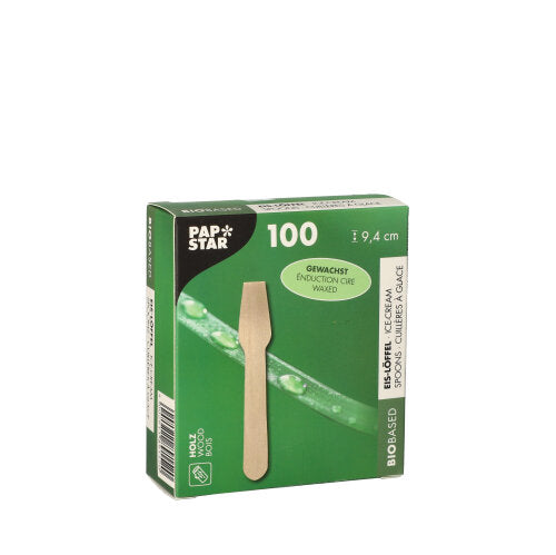Eine grüne Schachtel mit 100 Eislöffeln „pure“ (9,4 cm) aus gewachstem Holz der PAPSTAR GmbH zeigt einen Stiel und einen Pflanzenstiel auf der Vorderseite. Enthält 100 biobasierte Stiele in einer Faltschachtel.