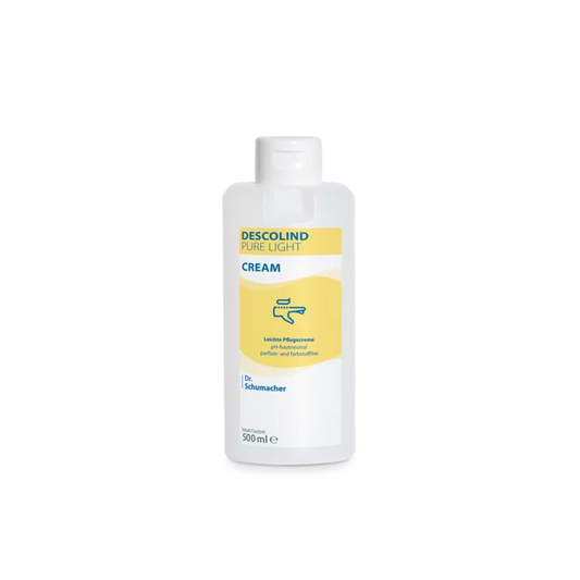 Eine weiße 500-ml-Plastikflasche der Dr. Schumacher GmbH Descolind Pure Light Cream Pflegecreme, parfümfrei für empfindliche Haut, hat ein gelbes Etikett mit blauer Schrift und ist vor einem schlichten weißen Hintergrund fotografiert.
