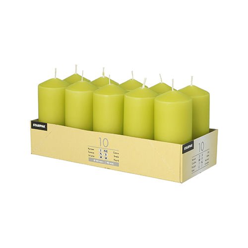 A cardboard tray labeled “Starpak 10 Pillar Candles Ø 40 mm · 90 mm” contains ten yellow-green candles arranged in two rows of five. Each candle has a visible wick, burns for a long time, and creates a romantic atmosphere. Brand: Starpak.