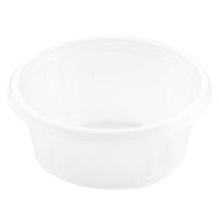 The Fixpack® Round Transparent PP container from Duni GmbH is a clear, round empty container with a slightly raised rim, shown in an oblique top view against a solid white background.