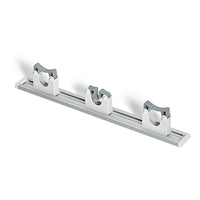 The Nölle Profi Brush HACCP equipment rack with 3 clamps (Ø 20–30 mm) from Nölle Profi Brush Bürsten- & Pinseltechnik e.K. is ideal for the safe, organized wall storage of brooms, mops, and cleaning equipment.