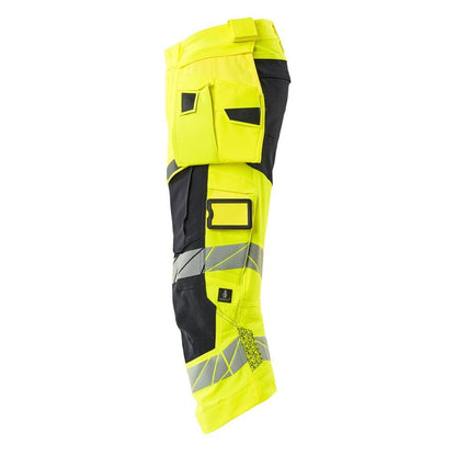 Pantalón tres cuartos, bolsillos colgantes, pantalón tres cuartos elástico