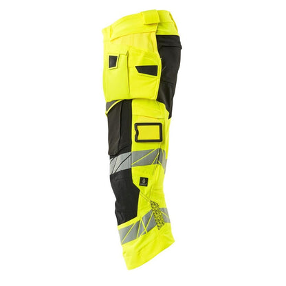 Pantalón tres cuartos, bolsillos colgantes, pantalón tres cuartos elástico