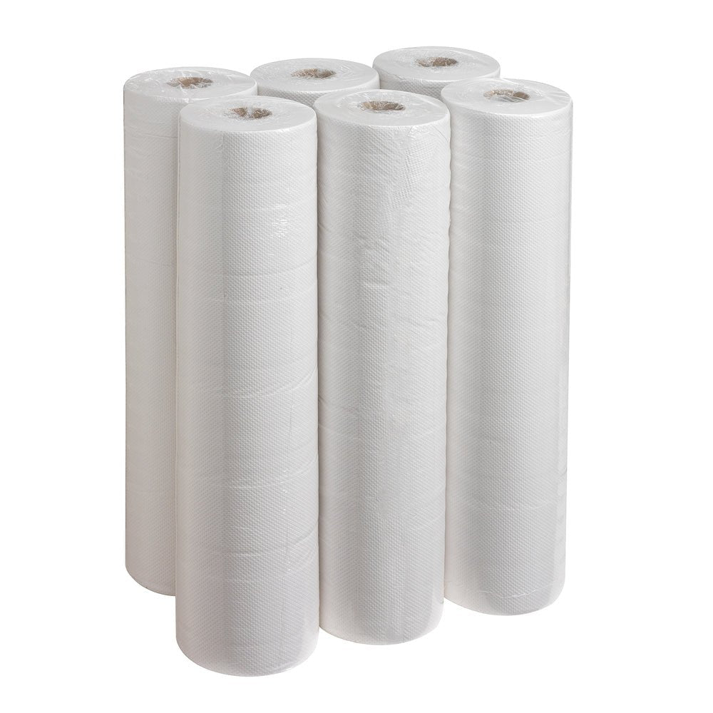 Six large Scott® ESSENTIAL™ medical rolls - White by Kimberly-Clark GmbH stand upright in two rows on a white background, packaged in a transparent plastic wrapping - ideal for hygienic use in medical areas.