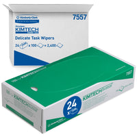 The image shows a box and an open carton of Kimtech® Science precision wipes from Kimberly-Clark GmbH: The green box contains 100 white, 2-ply wipes, while the larger carton contains 24 boxes, each with 100 wipes (for a total of 2,400 sheets).