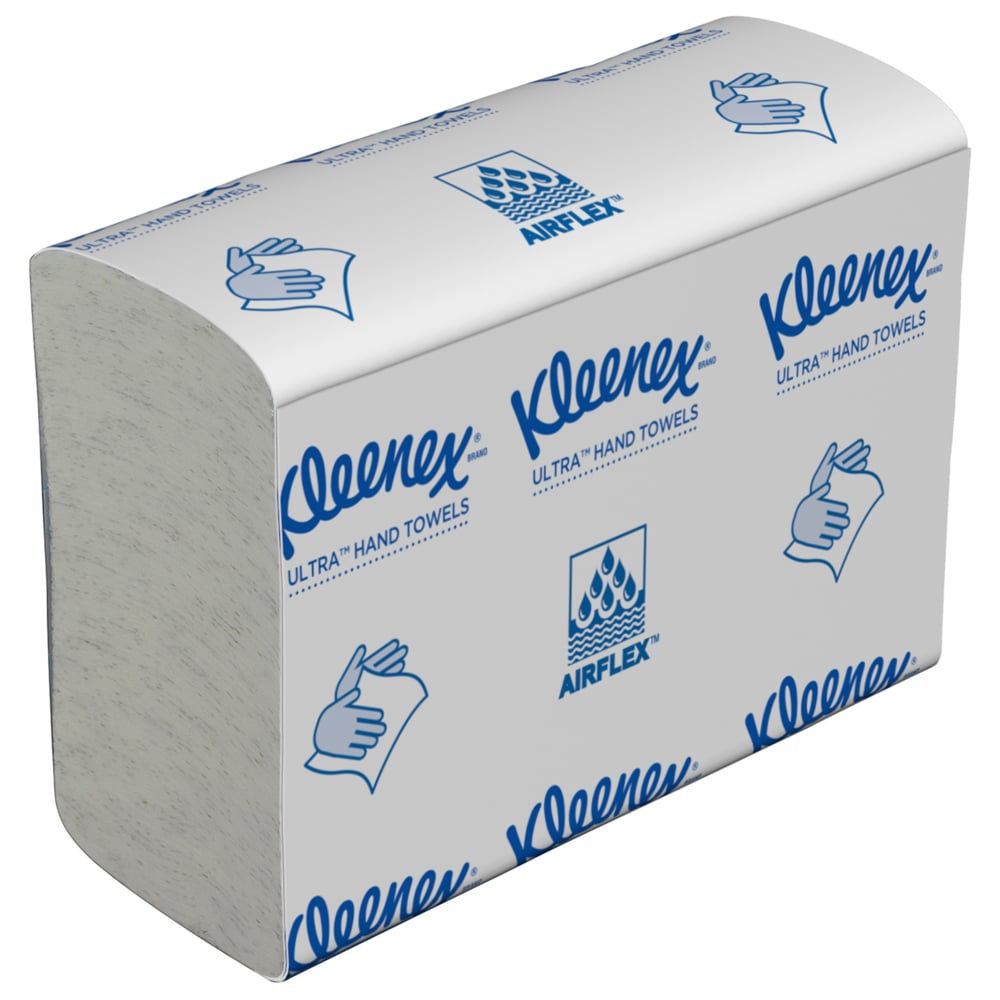 Una pila de toallas de mano Kleenex® Ultra™ MultiFold en blanco, 18 clips x 150 hojas por caja (18 paquetes), de Kimberly-Clark GmbH-toallas de papel de alta calidad para cualquier baño.