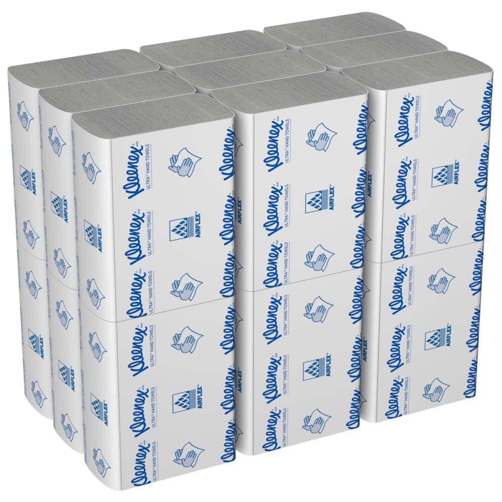 Una caja de toallas de mano Kleenex® Ultra™ de Kimberly-Clark GmbH contiene 18 paquetes MultiFold blancos de 150 hojas con textos y símbolos azules en el empaque.