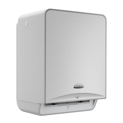 Der Kimberly-Clark Professional™ Icon™ Elektronische No Touch - Losse Module - Rolle / Silver Mosaic von Kimberly-Clark GmbH ist ein wandmontierter, berührungsloser Papierhandtuchspender mit einer strukturierten silbernen Mosaikfront und einer unteren Öffnung für die Handtuchausgabe.