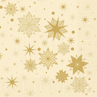 Un fondo estampado en tonos beige dorado con diversas formas doradas de estrellas y copos de nieve, inspirado en las servilletas de Duni GmbH de 40 x 40, de tres capas, modelo «1/4 Stargazing cream» (250 unidades), con lunares y detalles geométricos.