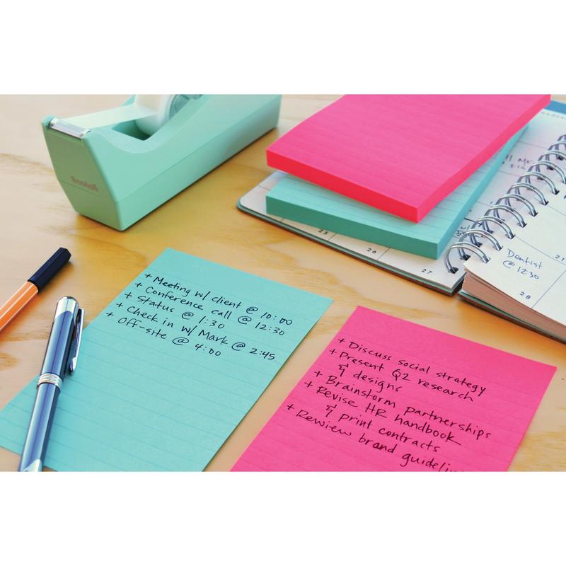 A desk with a green tape dispenser, a pen, an open planner, and 3M Deutschland GmbH Post-it® Super Sticky Notes in large format (lined, various colors, 101x152mm), featuring handwritten to-do lists.