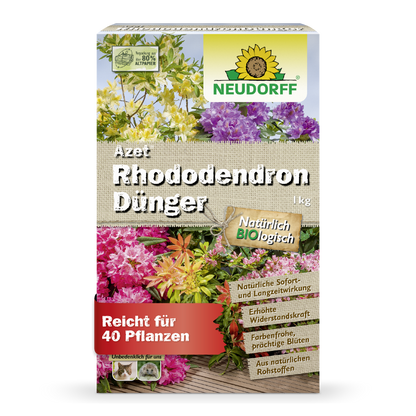 Eine 1 kg schwere, rechteckige Schachtel Azet RhododendronDünger von Neudorff Shop ist mit blühenden Blumen, deutschen Produktinformationen und einem grün-gelben Neudorff-Logo versehen und damit ideal für Rhododendron und Azaleen.