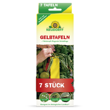 Eine rechteckige gelb-grüne Schachtel mit der Aufschrift "Neudorff Shop Gelbtafeln (kleinformatig)" und einer Abbildung von gelben Klebefallen zwischen Tomatenpflanzen. Bekämpft fliegende Schädlinge wie Trauermücken und Weiße Fliegen. Enthält 7 Stück.