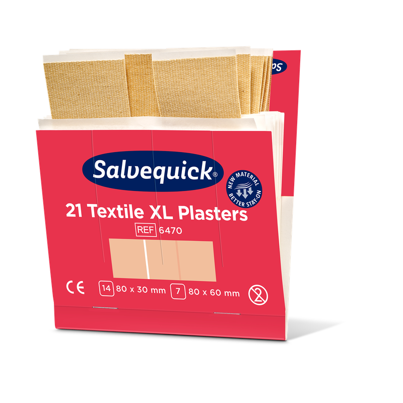 Eine rosa-weiße Schachtel von Orkla Wound Care AB mit der Aufschrift "Xl textilgips, 21 Stück/mine | Packung (6 Stück)" enthält große Gewebepflaster in zwei Größen: 80x30 mm und 80x60 mm. Oben auf der offenen Schachtel sind mehrere beigefarbene Pflaster zu sehen.