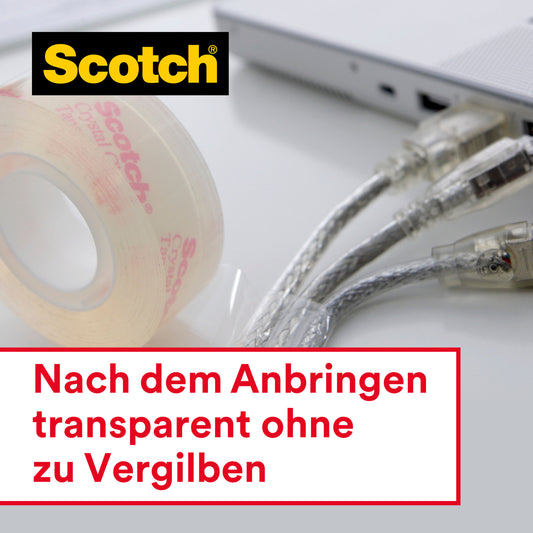 Eine Rolle Scotch® Crystal Klebeband 6-1925D (19 mm x 25 m) von 3M Deutschland GmbH steht neben drei angeschlossenen USB-Kabeln und einem Laptop. Der deutsche Text lautet: "Nach dem Anbringen transparent ohne zu Vergilben.