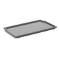 A gray, rectangular TASKI tray ½ from Diversey Deutschland GmbH & Co. OHG, made of plastic with raised edges and a notched corner, fits all TASKI trolleys and is depicted on a white background (Package: 1 piece).
