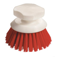 El cepillo para botones con cerdas duras de 90 x 120 mm de Diversey Deutschland GmbH & Co. OHG, con mango de plástico blanco y cerdas rojas, se muestra sobre un sencillo fondo blanco para ilustrar su limpieza a fondo.