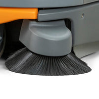 Close-up of the optional second side brush (1 piece) for the Balimat 6500 from Diversey Deutschland GmbH & Co. OHG, with black bristles and a gray-orange housing, factory-installed as part of the product.