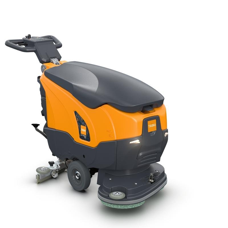 La TASKI ULTIMAXX 900 DD55 P BMS 13A gel ready de Diversey Deutschland GmbH & Co. OHG es una fregadora industrial de suelos naranja-gris con mangos, ruedas y cepillo, ideal para todas las superficies para un acabado limpio y brillante.