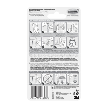 Auf der Rückseite der Command™ Bad Metallhaken "Modern Reflection" (3M Deutschland GmbH) Verpackung finden Sie eine bebilderte Anleitung zum Anbringen/Ablösen der Klebestreifen, Anwendungstipps, mehrsprachige Produktinformationen, den Barcode und Herstellerangaben am unteren Rand.