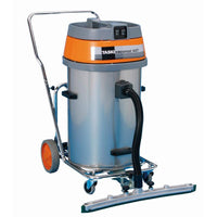 The TASKI vacumat 44 T from Diversey Germany is a powerful wet/dry vacuum cleaner with a stainless steel housing and a tilting chassis in an orange/gray design, complete with a frame, hose, and wide floor nozzle. Packaging: 1 unit.