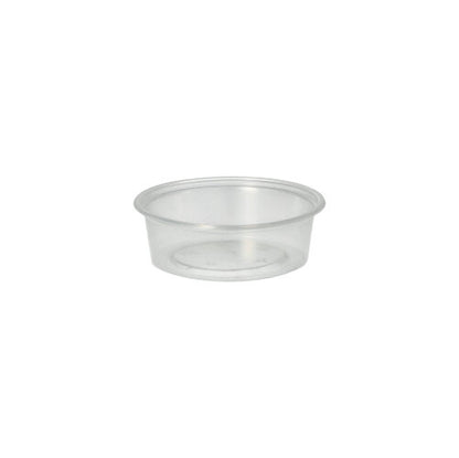 The Starpak 50 dressing cup, PP round Ø 7.1 cm transparent, is a clear, round dressing cup with a flat bottom and angled sides - perfect for catering service.