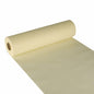 Der Starpak Tischläufer, stoffähnlich Vlies „soft selection“ (24 m x 40 cm), in Zartgelb ist hier teilweise ausgerollt mit sichtbarer Innenröhre abgebildet – perfekt als eleganter Tischläufer für stilvolle Ambiente.