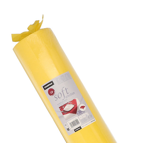 Eine Rolle Starpak-Tischdecke, stoffähnlich Vlies „Soft Selection“, steht schräg vor einem weißen Hintergrund und zeigt ein Etikett mit der Marke Starpak, dem Produktnamen und einem mit Geschirr gedeckten Tisch.