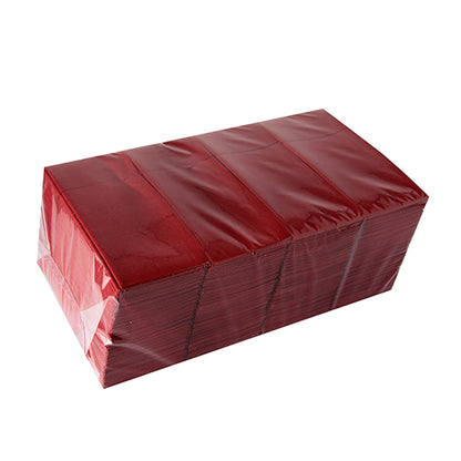 A stack of Starpak 480 cutlery bags made of Airlaid material (40x33 cm, with cutlery fold), hygienically packed in clear foil, presented on a white background.