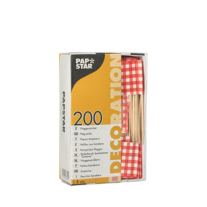 A box with 200 PAPSTAR 8 cm decoration picks from PAPSTAR GmbH with red and white checkered flag picks for catering or finger food is delivered in a box labeled “DECORATION” with a front window for better visibility.