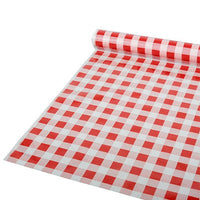 A partially unrolled Starpak tablecloth—a 50 m x 80 cm red “checkered” plastic sheet (1 roll)—is shown on a flat surface; the material appears to be a plastic sheet.