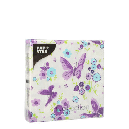 PAPSTAR servilletas en paquete de 20, 25x25 cm, 3 capas, ideal para decoración de mesa, con mariposas lilas y flores azules/lilas sobre fondo blanco. El paquete cuadrado muestra parcialmente la "Colección". Marca: PAPSTAR GmbH.