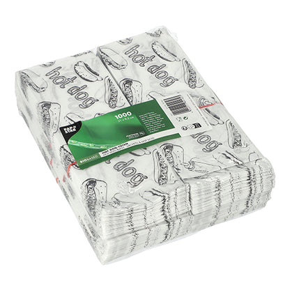 The 1000 PAPSTAR hot dog bags (21x8.5 cm, white) from PAPSTAR GmbH are shrink-wrapped and feature a black hot dog graphic and the "Hot Dog" lettering. A green label with product information is attached.