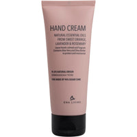 Un tubo rosa de 75 ml de crema de manos ENA Living, de Abena Re-Seller GmbH, con tapón negro y aceites esenciales de naranja dulce, lavanda y romero. Elaborada con un 96,8 % de ingredientes naturales para el cuidado intensivo de las manos secas. Disponible en cajas (paquete de 18 unidades).