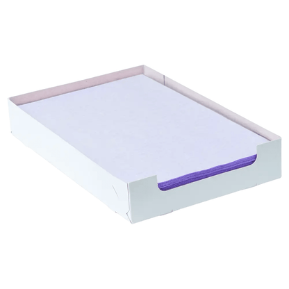 A white cardboard box from AMPri Handelsgesellschaft mbH contains a stack of purple AMPri Dental crepe-lined tray filter paper sheets measuring 18 x 28 cm. The top sheet is white and allows the purple edges underneath to show through slightly. The box is open at the top and has a simple design.