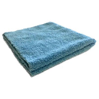 A folded Arcora Polish-Line high-pile microfiber cloth—seamless (pack of 10) from Arcora International GmbH—is shown against a white background—ideal for streak-free, gentle cleaning thanks to its seamless design.