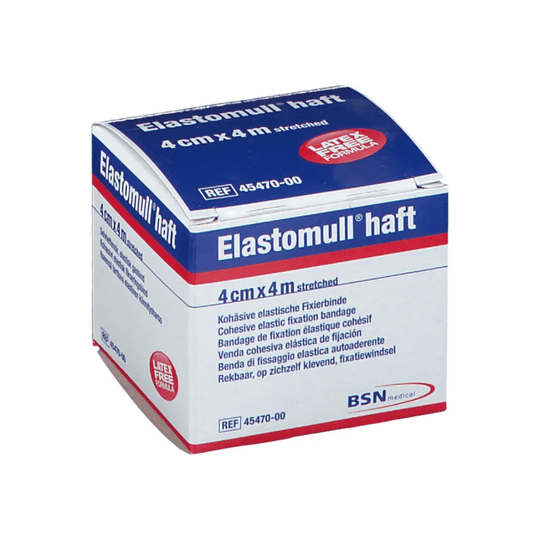 Una caja de BSN Elastomull® haft, una venda elástica de fijación con polímero sin látex. El envase es de color blanco con texto en azul y rojo; las dimensiones indicadas, una vez estirada, son de 4 cm x 4 m; la etiqueta es de BSN Medical GmbH.