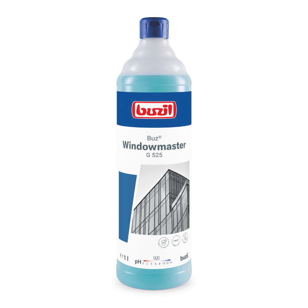 A bottle of Buzil Buz® Windowmaster G 525 glass and window cleaner concentrate from BUZIL-WERK Wagner GmbH & Co. KG with a blue cap and a label featuring the image of a building with glass windows. The bottle promises streak-free cleaning and is marked with a 1-liter volume and pH information for optimal performance.
