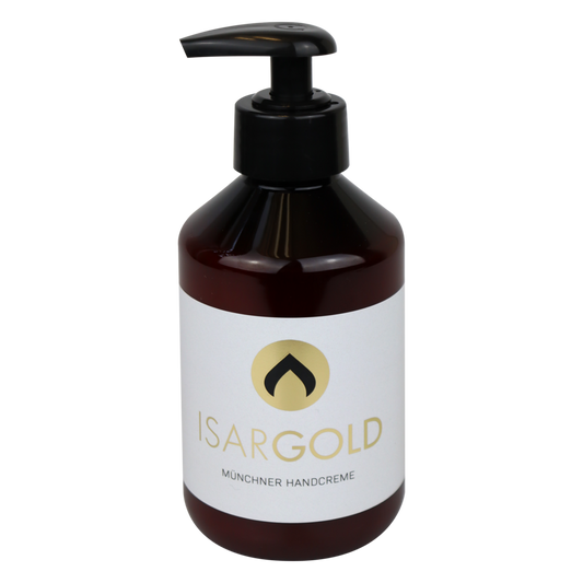 Eine braune Kunststoff-Pumpflasche mit der Aufschrift "Dr. Schnell ISARGOLD Handcreme mit wertvollen Essenzen, für intensive Hautpflege" (250 ml) der DR.SCHNELL GmbH & Co. KGaA steht vor einem schlichten weißen Hintergrund.