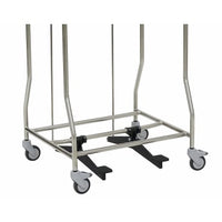 A sturdy metal cart frame with four swivel casters is equipped with two Novocal foot pedals for the Novocal pedaling mechanism, which are secured to the floor. The image highlights the cart's robust construction and improved mobility.