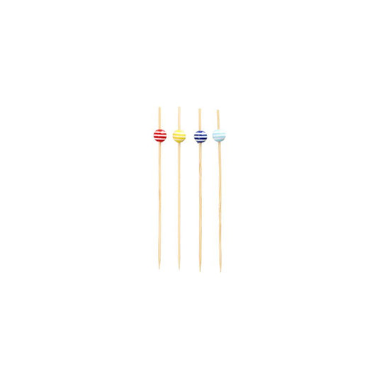 Cuatro pinchos de aperitivos de 12 cm de tamaño PAPSTAR, cada uno adornado con una perla de rayas en rojo, amarillo, azul y azul claro, están dispuestos en una fila. Los artículos elegantes de PAPSTAR GmbH están fabricados como productos desechables sostenibles y descansan elegantemente sobre un fondo blanco simple.