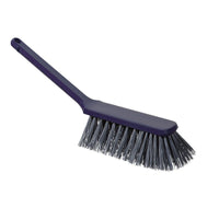 The METDEC PREMIUM HAND BROOM from Haug Bürsten KG has stiff gray and blue PBT bristles, a long handle, and measures 310x40x45mm. Pictured being held in the hand against a white background.