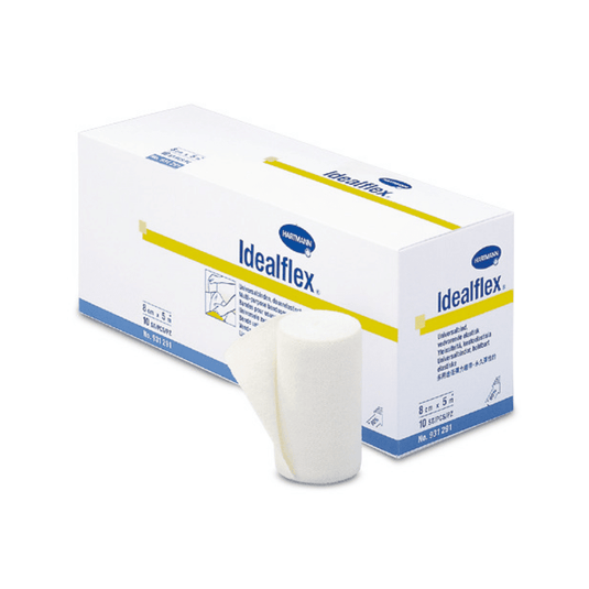 Una caja de vendajes universales ligeros Idealflex® de Paul Hartmann AG, en la que un rollo está parcialmente desenrollado en la parte delantera, lo que permite apreciar la textura y la forma del producto. El embalaje es de color blanco y azul, con texto y detalles de la marca.