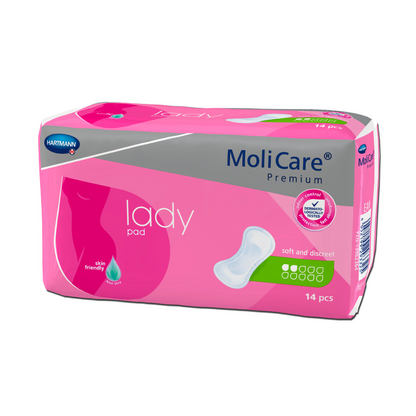 Esta imagen muestra un paquete de almohadillas Hartmann MoliCare® Premium lady pad. El empaque es rosa y gris con texto blanco. El producto de Paul Hartmann AG para incontinencia leve se promociona como suave y discreto, amigable con la piel y contiene 14 unidades. En la parte frontal se ve una pequeña imagen de una almohadilla.