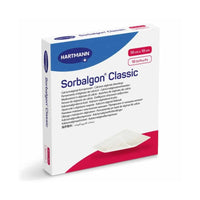 The image shows a package of Hartmann Sorbalgon® Classic calcium alginate compresses manufactured by Paul Hartmann AG. The predominantly white packaging, featuring blue and red elements, bears the inscription “Calcium Alginate Compresses” and contains 10 compresses measuring 10 cm x 10 cm.