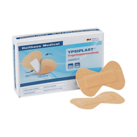 A package of Holthaus Ypsiplast® elastic fingertip bandages from Holthaus Medical GmbH & Co. KG, with two bandages pictured on the front. The package contains 50 pieces, each measuring 4.5 cm x 8 cm, and bears the inscription “Made in Germany.”