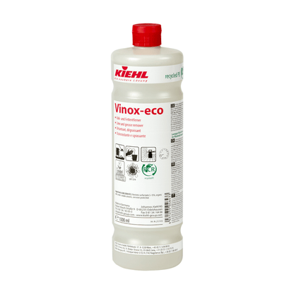 White plastic bottle of the Kiehl Vinox-eco lime and grease remover from Johannes Kiehl KG with a red cap. The front label contains product information, application instructions, and pictograms.