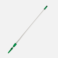 The Johannes Kiehl KG Kiehl Unger telescopic pole (2 x 1.25 m) has green plastic handles and locks at both ends, making it ideal for oil roller handles and neoprene pullers. Shown on a solid white background. Packaging: 1 piece.
