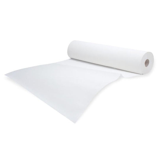 Un rollo de papel crepé médico blanco Meditrade Rollicel®, ligeramente desenrollado sobre un fondo blanco liso. El rollo está colocado en diagonal, con el extremo ligeramente doblado hacia un lado.