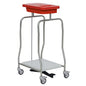 Hygienic waste disposal is achieved with the Novocal stainless steel waste collector "Compact": The robust single collector on four wheels with a red lid, white platform base, and foot pedal allows for convenient, contactless use.